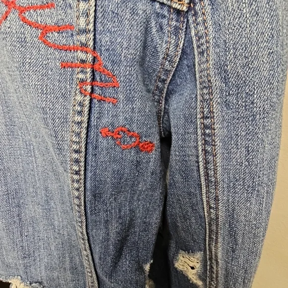 Classic Denim Jacket with Red Floral Detail - Picture 5 of 12